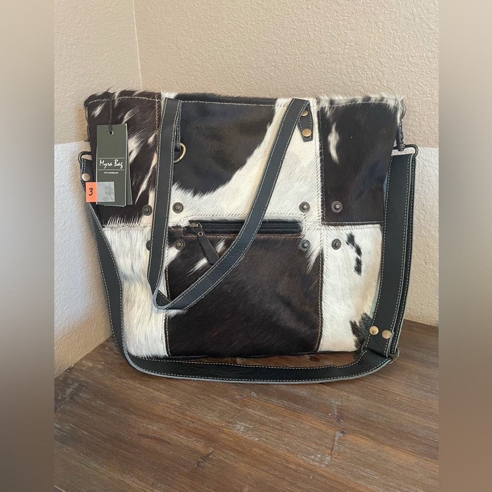 Myra box. Cowhide/leather